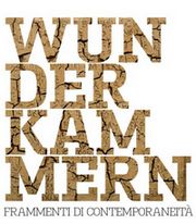 particolare della locandina della mostra: in primo piano la scritta "WUN DER KAM MERN"