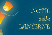 stralcio della locandina con scritta "notte delle lanterne" e lanterna luminosa